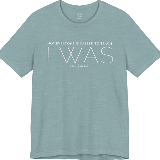 NOT EVERYONE IS CALLED TO TEACH I WAS yoga teacher gift tee flat lay in Heather Blue Lagoon — Yoga Teacher Gifts collection by Ramro Yoga Wear