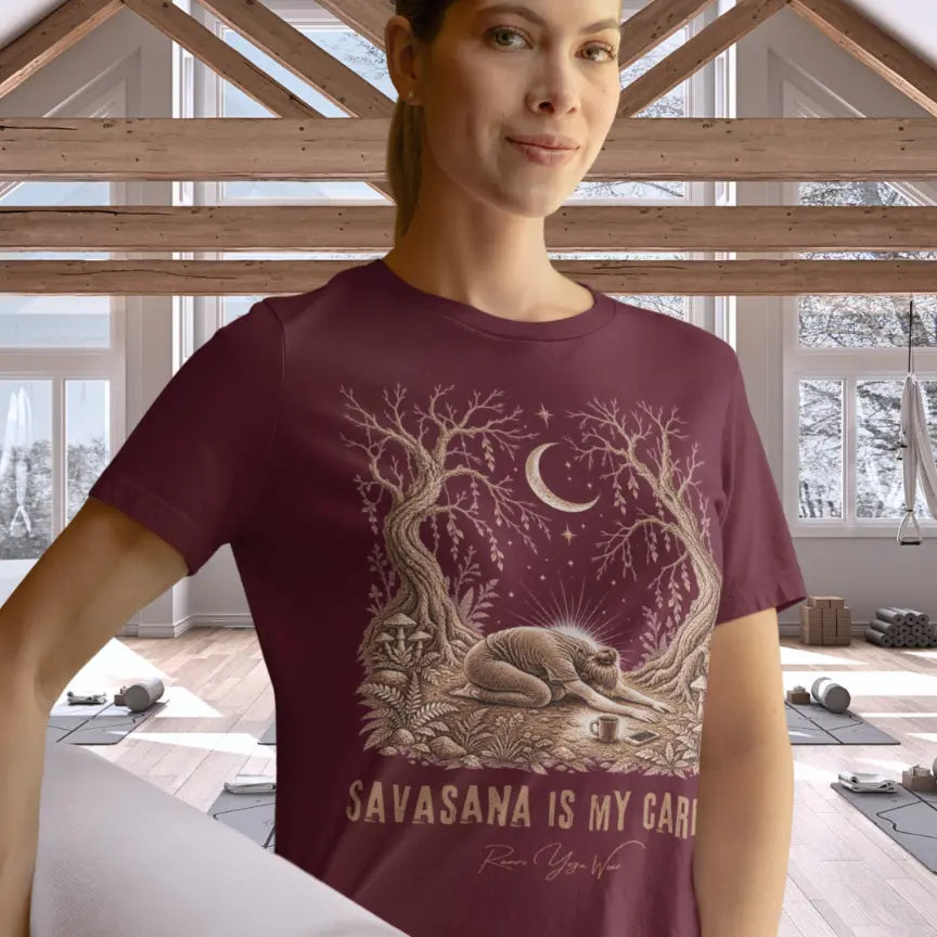Person wearing the Cardio T-Shirt in Heather Cardinal, standing indoors in a bright room with wooden beams ready for the Yoga Class  — Funny Yoga Shirts collection by Ramro Yoga Wear.