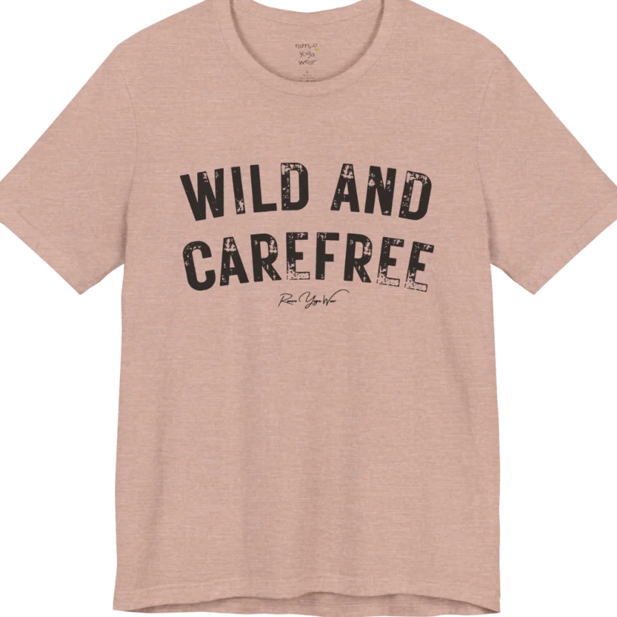 Bold typography reading "Wild And Carefree" — Funny Yoga Shirts collection by Ramro Yoga Wear in Heather Prism Peach