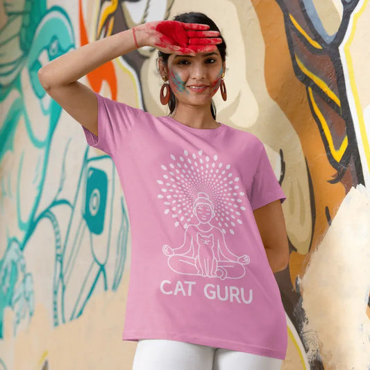 Lifestyle image of woman wearing Cat Guru T-Shirt with playful mindful cat artwork and relaxed colorful yoga-inspired fashion styling.