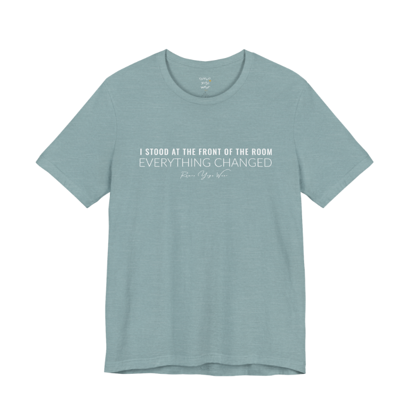 I STOOD AT THE FRONT OF THE ROOM EVERYTHING CHANGED yoga teacher gift tee flat lay in Heather Blue Lagoon — Yoga Teacher Gifts collection by Ramro Yoga Wear