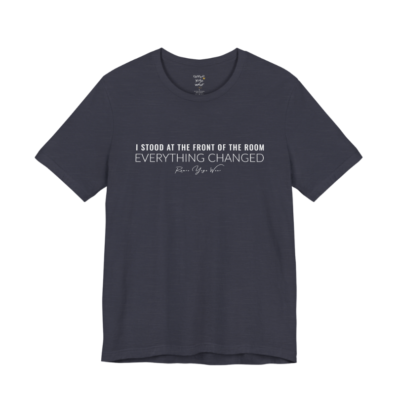 I STOOD AT THE FRONT OF THE ROOM EVERYTHING CHANGED yoga teacher gift tee flat lay in Heather Midnight Navy — Yoga Teacher Gifts collection by Ramro Yoga Wear