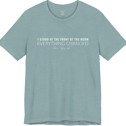 I STOOD AT THE FRONT OF THE ROOM EVERYTHING CHANGED yoga teacher gift tee flat lay in Heather Blue Lagoon — Yoga Teacher Gifts collection by Ramro Yoga Wear