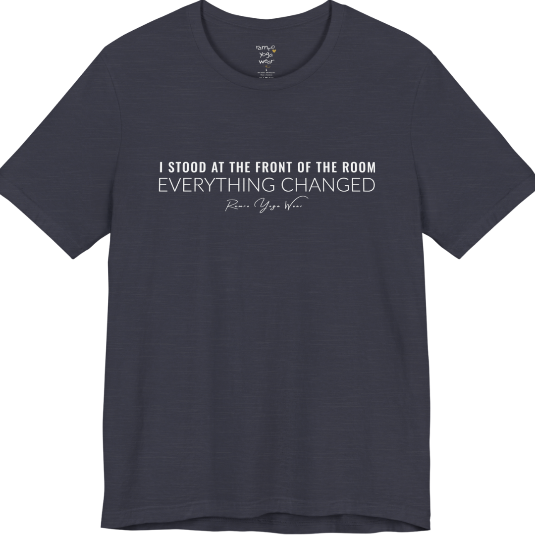 I STOOD AT THE FRONT OF THE ROOM EVERYTHING CHANGED yoga teacher gift tee flat lay in Heather Midnight Navy — Yoga Teacher Gifts collection by Ramro Yoga Wear