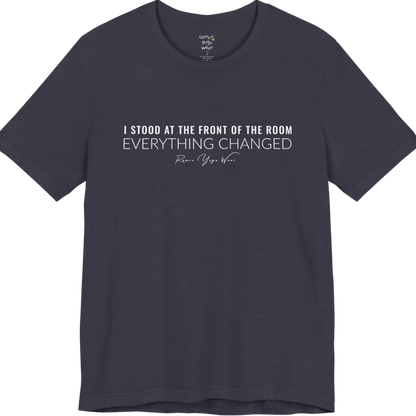 I STOOD AT THE FRONT OF THE ROOM EVERYTHING CHANGED yoga teacher gift tee flat lay in Heather Midnight Navy — Yoga Teacher Gifts collection by Ramro Yoga Wear