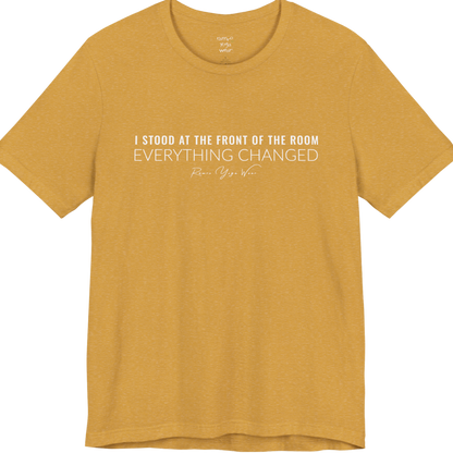 I STOOD AT THE FRONT OF THE ROOM EVERYTHING CHANGED yoga teacher gift tee flat lay in Heather Mustard — Yoga Teacher Gifts collection by Ramro Yoga Wear