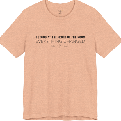 I STOOD AT THE FRONT OF THE ROOM EVERYTHING CHANGED yoga teacher gift tee flat lay in Heather Peach — Yoga Teacher Gifts collection by Ramro Yoga Wear