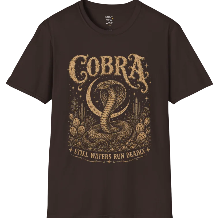 A grunge tee with an illustrated cobra design, hood flared, botanical linework framing the scene, text reading "Cobra" and "Still Waters Run Deadly" — Wild Animals collection by Ramro Yoga Wear in Dark Chocolate.