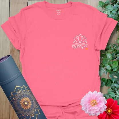 Coral Silk Beautiful Flow T-Shirt featuring a white lotus design with Ramro logo and heart. Mindful yoga tee with uplifting energy.