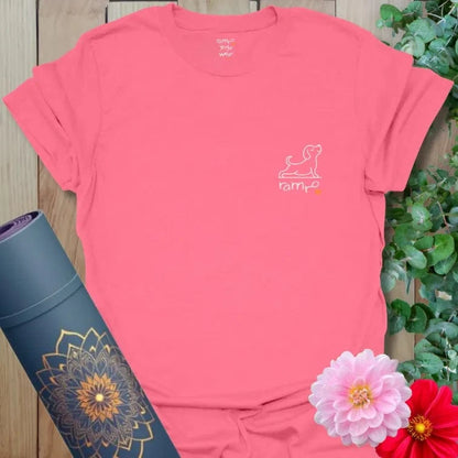 Coral Silk Good Energy T-Shirt featuring peaceful yoga dog line drawing and Ramro logo. Soft and vibrant yoga wear.