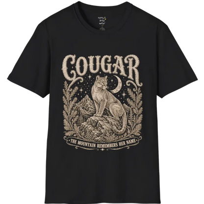 Cougar T-Shirt flat lay with a cougar perched on a mountain rock ledge beneath a crescent moon and pine framing — vintage engraved graphic tee by Ramro Yoga Wear in Black.