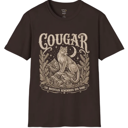 Cougar T-Shirt flat lay with a cougar perched on a mountain rock ledge beneath a crescent moon and pine framing — vintage engraved graphic tee by Ramro Yoga Wear in Dark Chocolate.