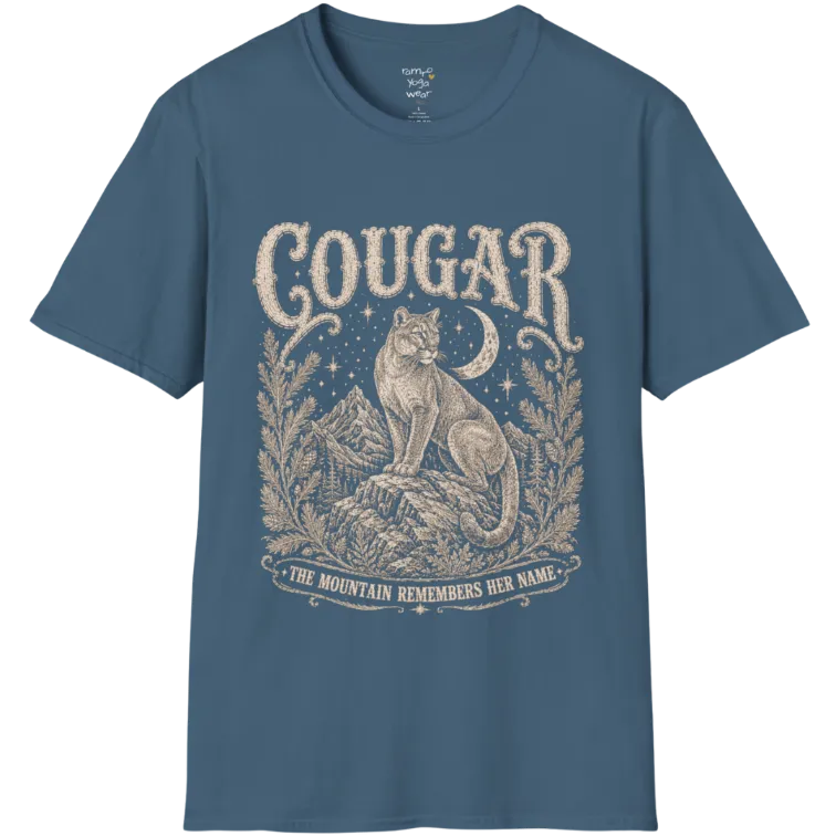 Cougar T-Shirt flat lay with a cougar perched on a mountain rock ledge beneath a crescent moon and pine framing — vintage engraved graphic tee by Ramro Yoga Wear in Indigo Blue.