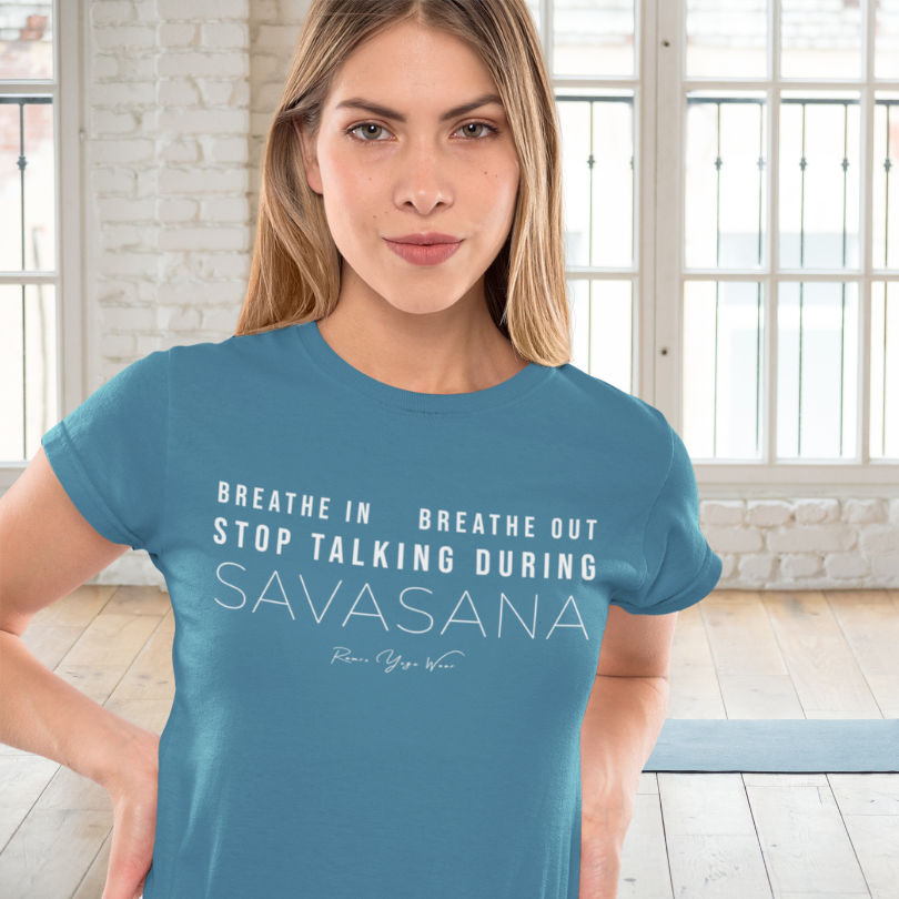 Woman wearing Cue Heather Deep Teal yoga teacher gift tee in front of a window — Yoga Teacher Gifts collection by Ramro Yoga Wear