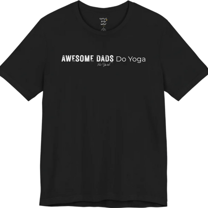 A short sleeved tee called the Dads T-Shirt, flat lay and a soft cotton blend shirt. Simply says, Awesome Dads Do Yoga. Design highlights bold distressed block lettering for Awesome Dads beside lighter thin lettering for Do Yoga, with a small script signature underneath. Color is Black.
