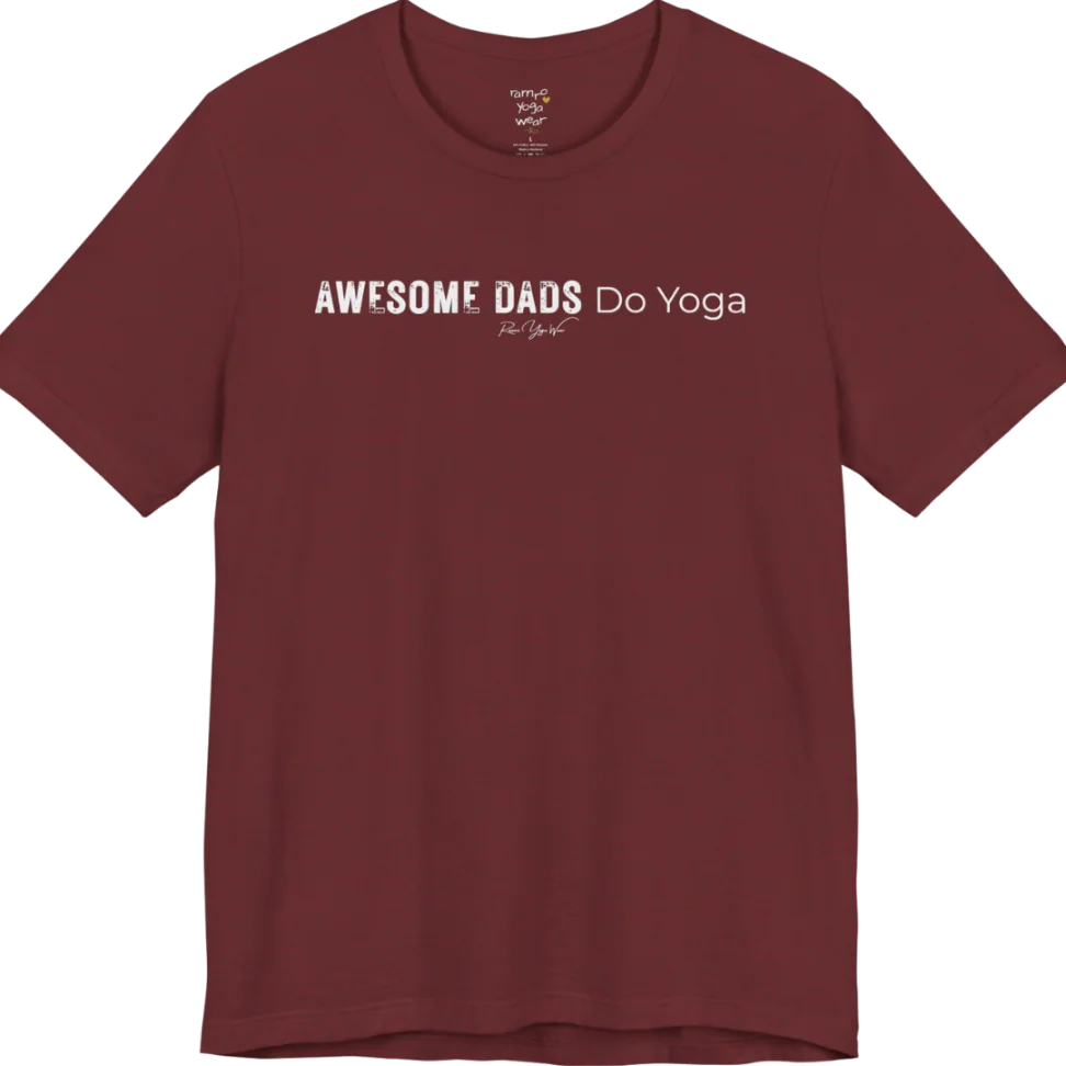 A short sleeved tee called the Dads T-Shirt, flat lay and a soft cotton blend shirt. Simply says, Awesome Dads Do Yoga. Design highlights bold distressed block lettering for Awesome Dads beside lighter thin lettering for Do Yoga, with a small script signature underneath. Color is Heather Cardinal.
