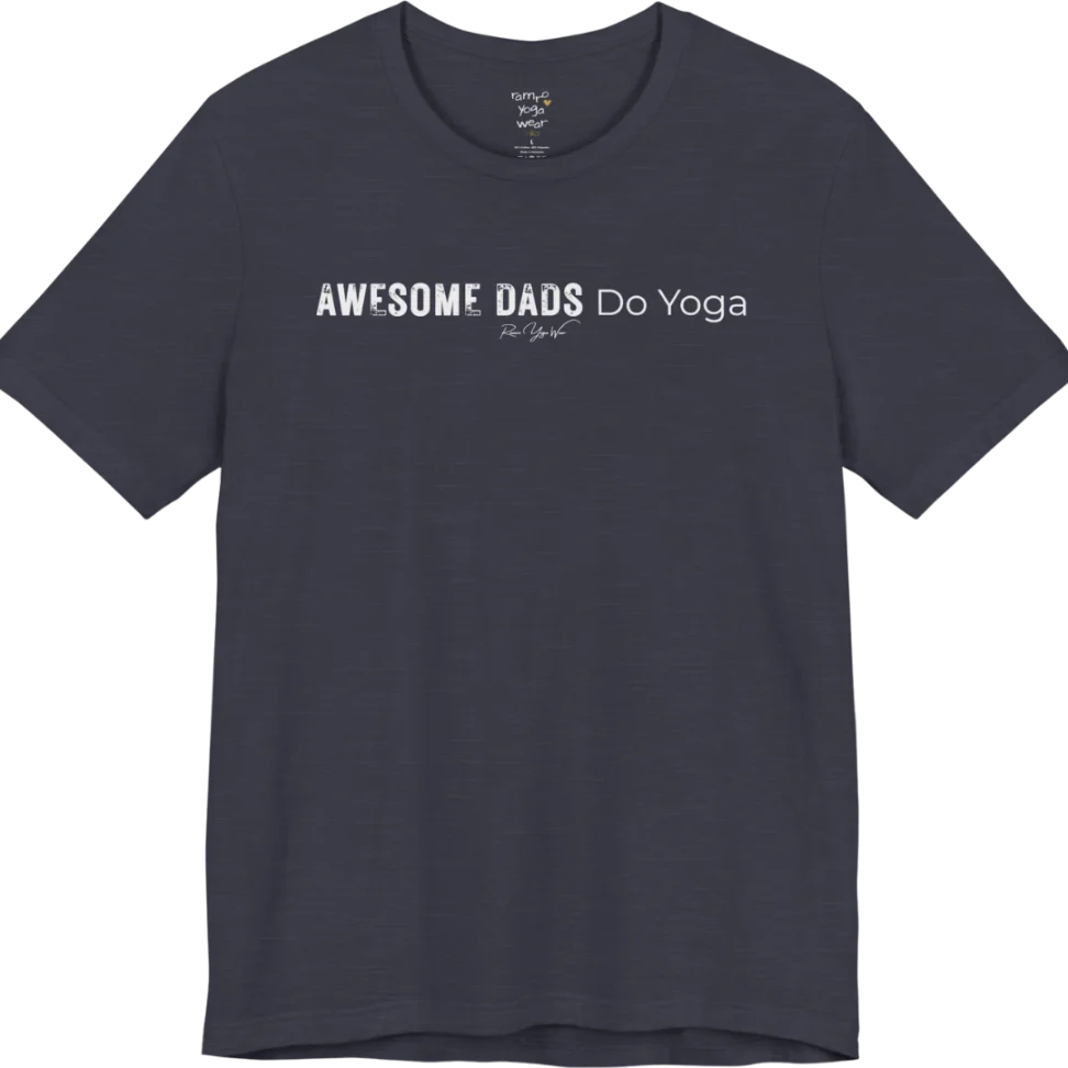 A short sleeved tee called the Dads T-Shirt, flat lay and a soft cotton blend shirt. Simply says, Awesome Dads Do Yoga. Design highlights bold distressed block lettering for Awesome Dads beside lighter thin lettering for Do Yoga, with a small script signature underneath. Color is Heather Midnight Navy.