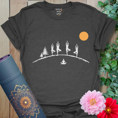 Dark Heather Tree Line T-Shirt with subtle white Tree Pose figures and sun element. Grounded, everyday yoga t-shirt.