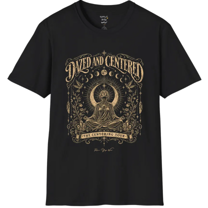 A short sleeved tee called the Dazed T-Shirt, flat lay and a soft cotton shirt. Simply says, Dazed and Centered, The Centering Tour. Design highlights a person meditating in lotus pose before a crescent moon with a mandala and radiating rays, framed by moon phases, songbirds, climbing vines, hanging feathers and crystals. Color is Black.