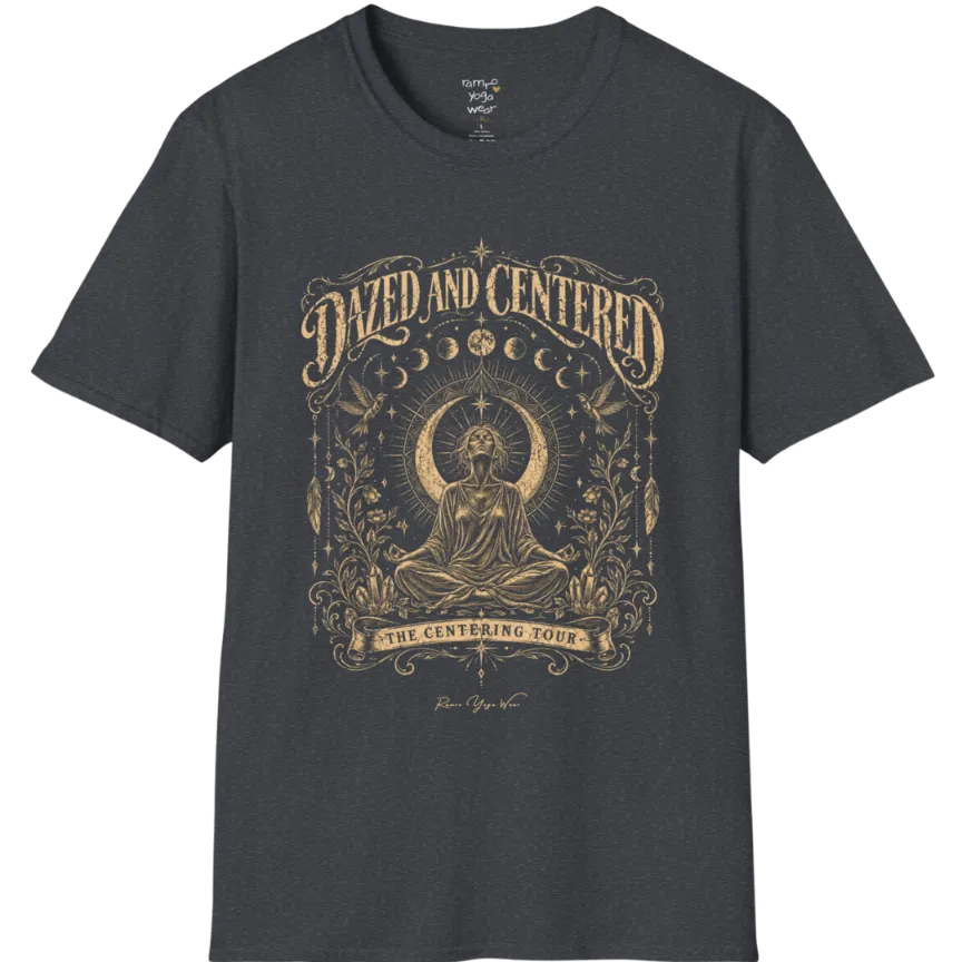 A short sleeved tee called the Dazed T-Shirt, flat lay and a soft cotton shirt. Simply says, Dazed and Centered, The Centering Tour. Design highlights a person meditating in lotus pose before a crescent moon with a mandala and radiating rays, framed by moon phases, songbirds, climbing vines, hanging feathers and crystals. Color is Dark Heather Grey.