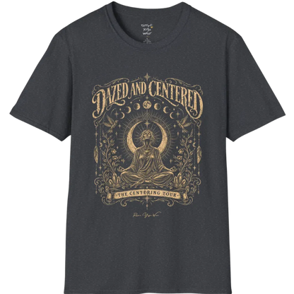 A short sleeved tee called the Dazed T-Shirt, flat lay and a soft cotton shirt. Simply says, Dazed and Centered, The Centering Tour. Design highlights a person meditating in lotus pose before a crescent moon with a mandala and radiating rays, framed by moon phases, songbirds, climbing vines, hanging feathers and crystals. Color is Dark Heather Grey.