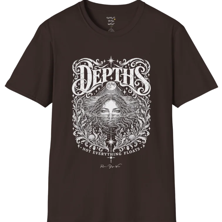 Short sleeved tee, illustration of a  woman submerged to the eyes in water, hair flowing into seaweed and shells, a full moon above her and stars scattered throughout, framed by ornate botanical linework. Depths T-Shirt flat lay is a Gildan 64000 and the color is Dark Chocolate.
