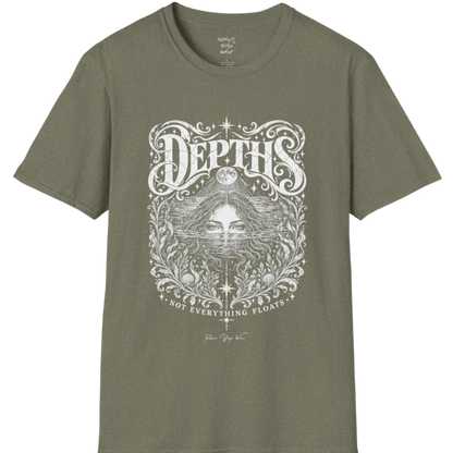 Short sleeved tee, illustration of a  woman submerged to the eyes in water, hair flowing into seaweed and shells, a full moon above her and stars scattered throughout, framed by ornate botanical linework. Depths T-Shirt flat lay is a Gildan 64000 and the color is Heather Military Green.