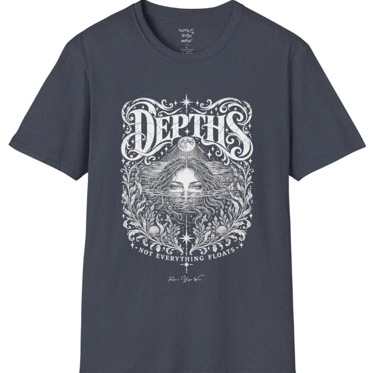 Short sleeved tee, illustration of a  woman submerged to the eyes in water, hair flowing into seaweed and shells, a full moon above her and stars scattered throughout, framed by ornate botanical linework. Depths T-Shirt flat lay is a Gildan 64000 and the color is Heather Navy.