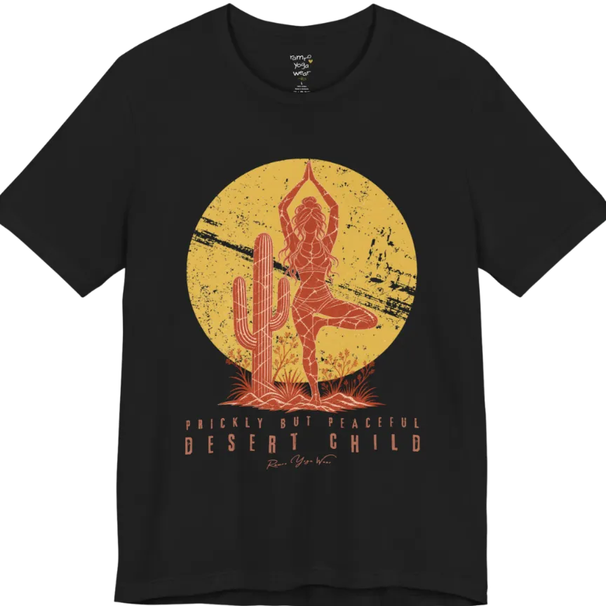 A short sleeved tee called the Desert Child T-Shirt, flat lay and a Bella + Canvas 3001 shirt. Simply says, Prickly But Peaceful, Desert Child. Design highlights a person in Tree Pose beside a desert cactus, with a large distressed sun in the background, in a rustic, distressed illustration. Color is Black.