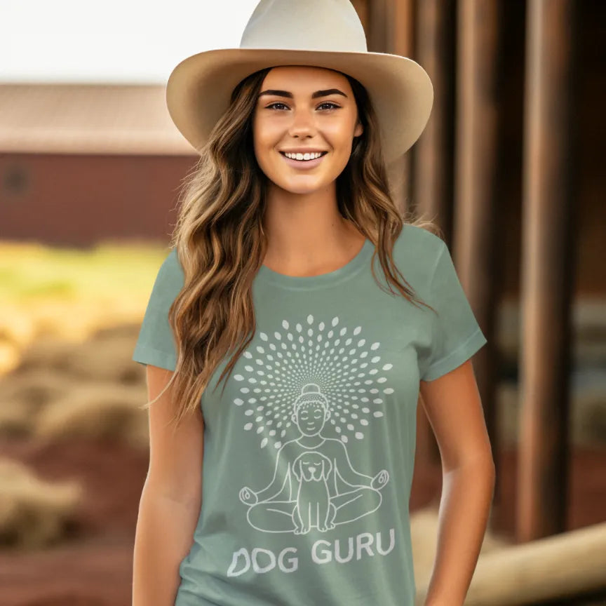 Woman wearing Sage Dog Guru T-Shirt outdoors with western-inspired styling and mindful yoga dog artwork.