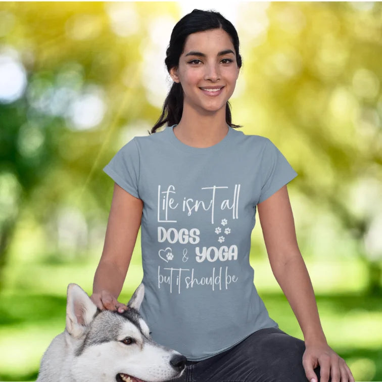 Woman wearing Dog Sage yoga shirt outdoors with her dog — The Vault collection by Ramro Yoga Wear