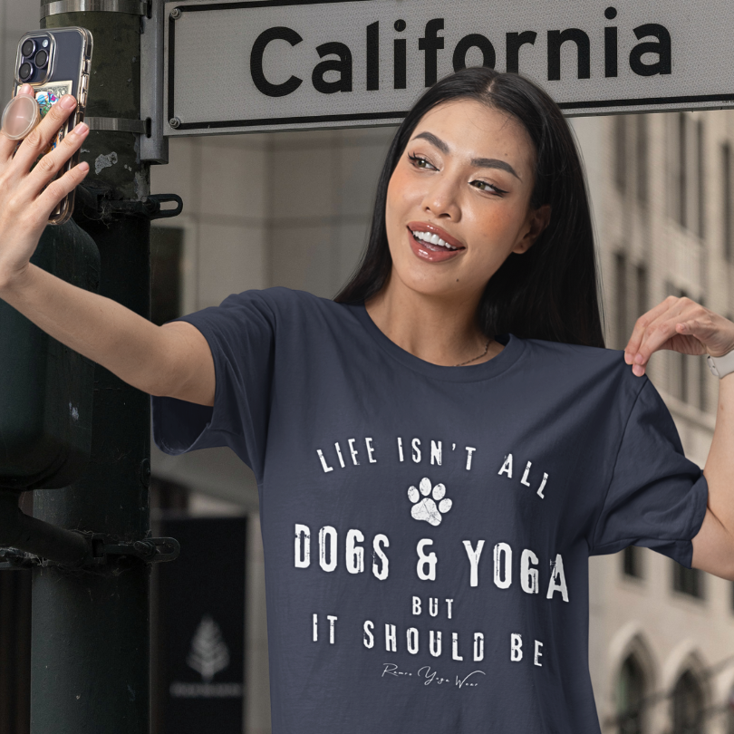 Woman wearing Dogs and Yoga Heather Midnight Navy funny yoga shirt on California street — Funny Yoga Shirts collection by Ramro Yoga Wear