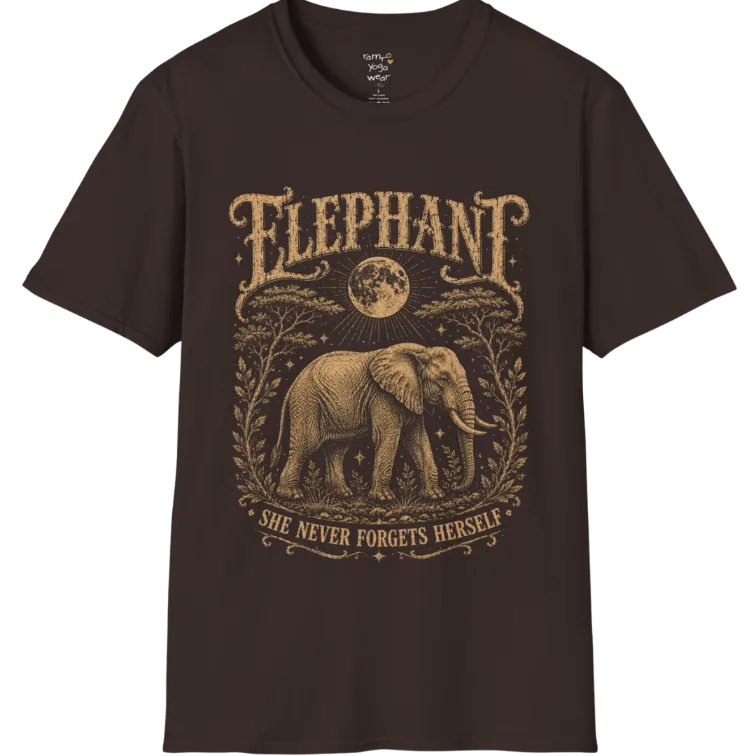 A grunge tee with an illustrated elephant beneath a crescent moon, botanical linework framing the scene, text reading "Elephant" and "She Never Forgets Herself" — Wild Animals collection by Ramro Yoga Wear in Dark Chocolate.