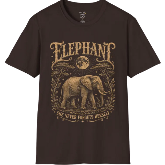 A grunge tee with an illustrated elephant beneath a crescent moon, botanical linework framing the scene, text reading "Elephant" and "She Never Forgets Herself" — Wild Animals collection by Ramro Yoga Wear in Dark Chocolate.