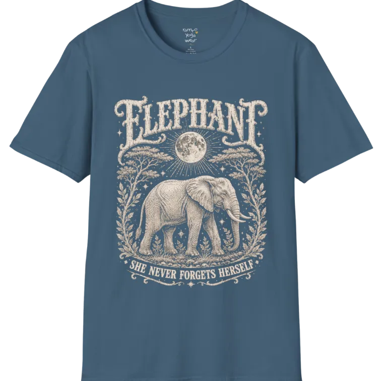 A grunge tee with an illustrated elephant beneath a crescent moon, botanical linework framing the scene, text reading "Elephant" and "She Never Forgets Herself" — Wild Animals collection by Ramro Yoga Wear in Indigo Blue.