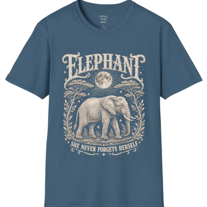 A grunge tee with an illustrated elephant beneath a crescent moon, botanical linework framing the scene, text reading "Elephant" and "She Never Forgets Herself" — Wild Animals collection by Ramro Yoga Wear in Indigo Blue.