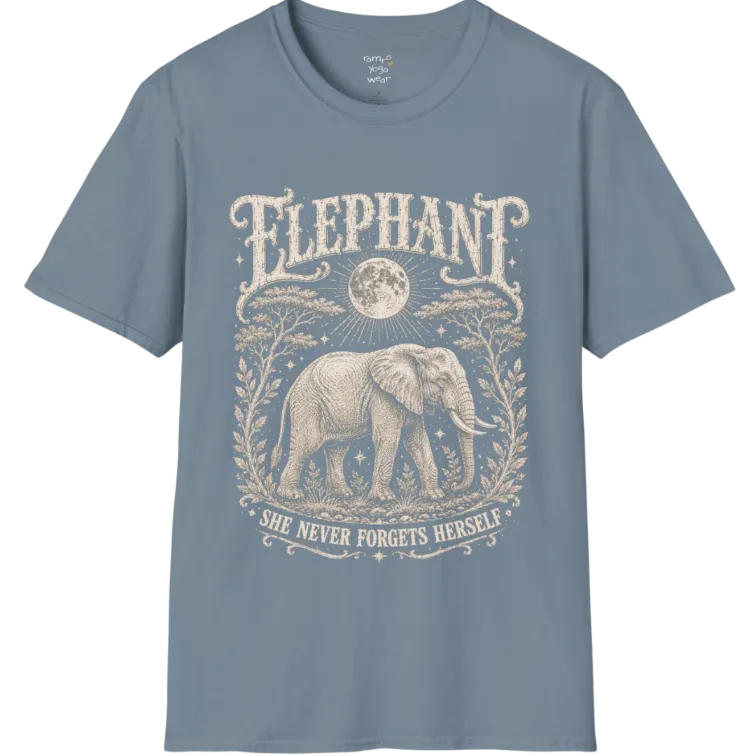 A grunge tee with an illustrated elephant beneath a crescent moon, botanical linework framing the scene, text reading "Elephant" and "She Never Forgets Herself" — Wild Animals collection by Ramro Yoga Wear in Stone Blue