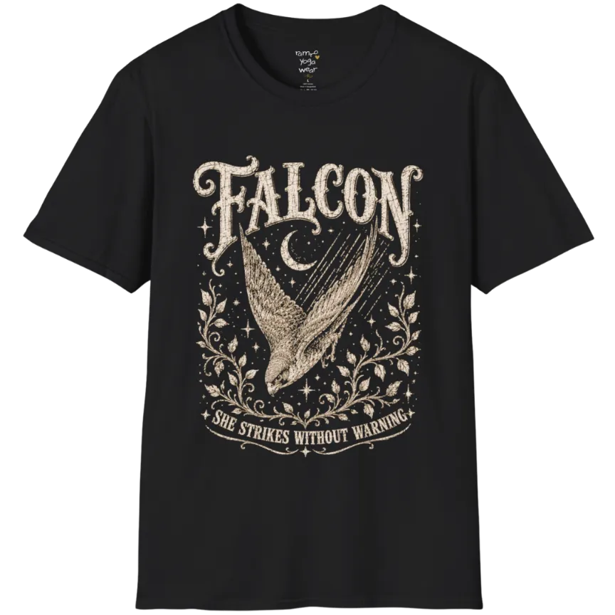 A grunge tee with an illustrated falcon wing design, crescent moon, and botanical linework, text reading "Falcon" and "She Strikes Without Warning" — Wild Animals collection by Ramro Yoga Wear in Black.