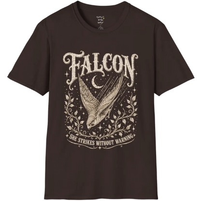 A grunge tee with an illustrated falcon wing design, crescent moon, and botanical linework, text reading "Falcon" and "She Strikes Without Warning" — Wild Animals collection by Ramro Yoga Wear in Dark Chocolate.