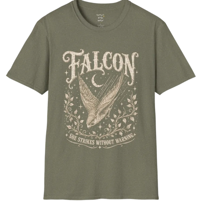 A grunge tee with an illustrated falcon wing design, crescent moon, and botanical linework, text reading "Falcon" and "She Strikes Without Warning" — Wild Animals collection by Ramro Yoga Wear in Heather Military Green.