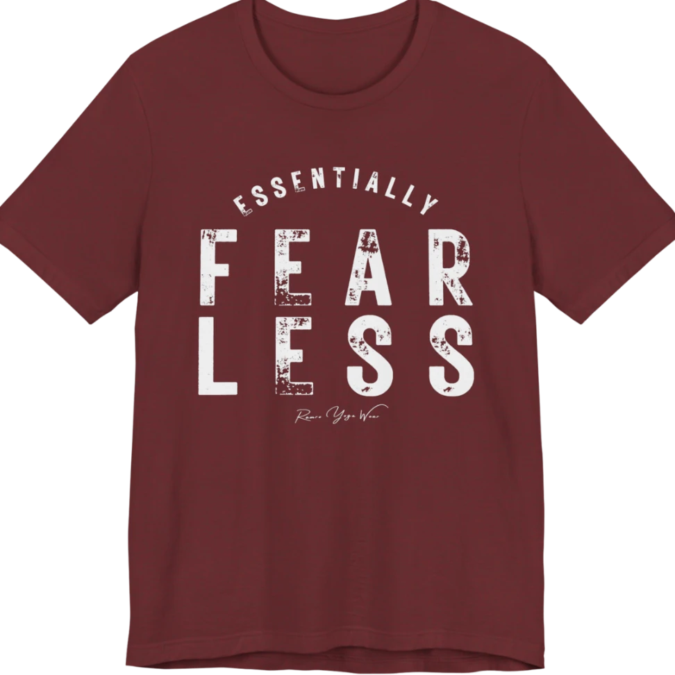 A typographic grunge tee reading "Essentially Fear Less" in bold block lettering — Funny Yoga Shirts collection by Ramro Yoga Wear in Heather Cardinal.