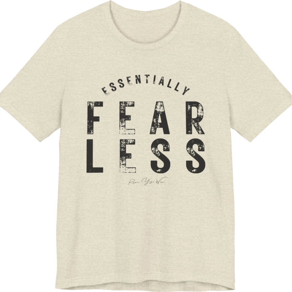 A typographic grunge tee reading "Essentially Fear Less" in bold block lettering — Funny Yoga Shirts collection by Ramro Yoga Wear in Heather Prism Natural.