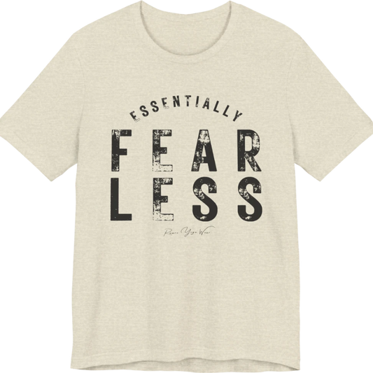 A typographic grunge tee reading "Essentially Fear Less" in bold block lettering — Funny Yoga Shirts collection by Ramro Yoga Wear in Heather Prism Natural.