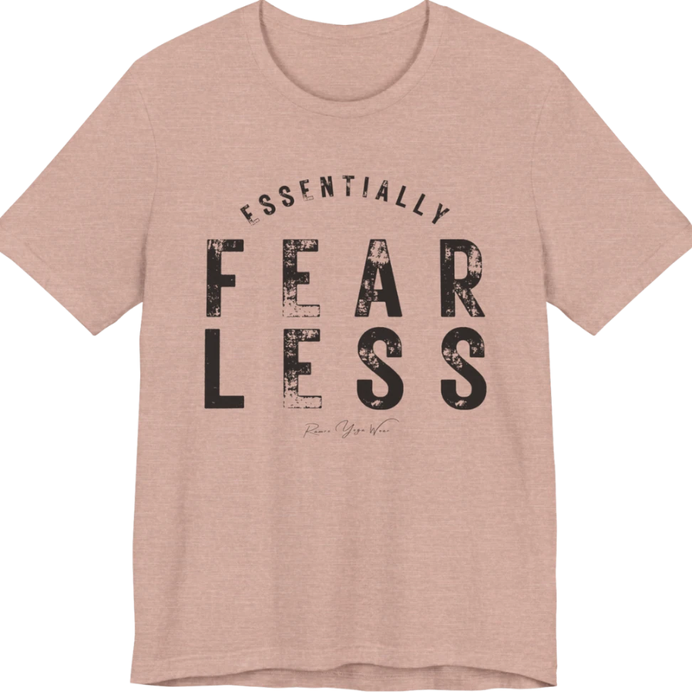 A typographic grunge tee reading "Essentially Fear Less" in bold block lettering — Funny Yoga Shirts collection by Ramro Yoga Wear in Heather Prism Peach.