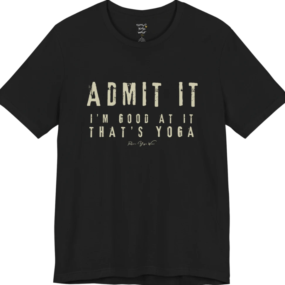 A short sleeved tee called the Good T-Shirt, flat lay and a Bella+Canvas 3001 shirt. Simply says, Admit It, I'm Good At It, That's Yoga. Design highlights bold distressed cream lettering with ADMIT IT large above two smaller lines of wide-spaced text. Color is Black.