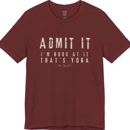 A short sleeved tee called the Good T-Shirt, flat lay and a Bella+Canvas 3001 shirt. Simply says, Admit It, I'm Good At It, That's Yoga. Design highlights bold distressed cream lettering with ADMIT IT large above two smaller lines of wide-spaced text. Color is Heather Cardinal.