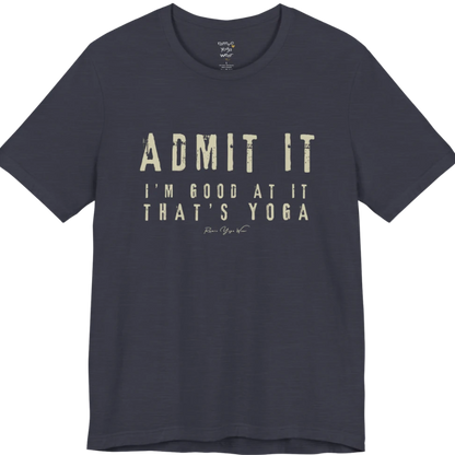 A short sleeved tee called the Good T-Shirt, flat lay and a Bella+Canvas 3001 shirt. Simply says, Admit It, I'm Good At It, That's Yoga. Design highlights bold distressed cream lettering with ADMIT IT large above two smaller lines of wide-spaced text. Color is Heather Midnight Navy.