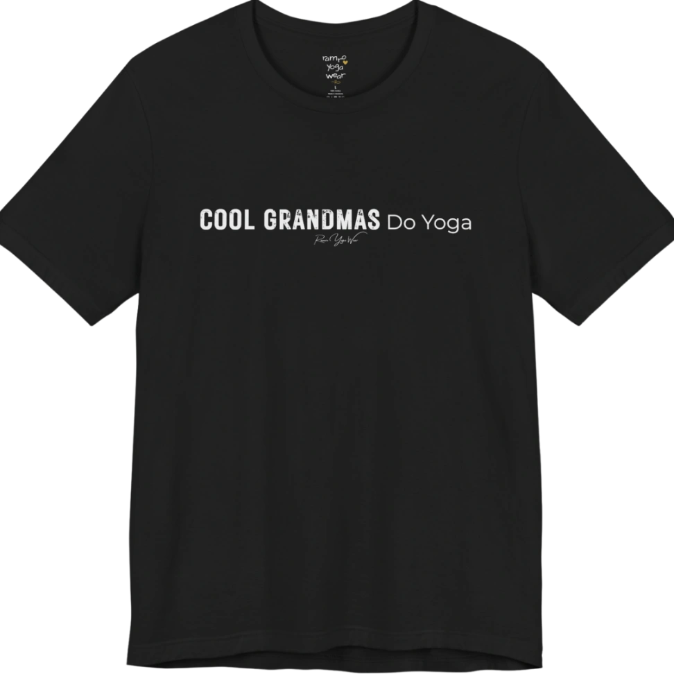 A short sleeved tee called the Grandmas T-Shirt, flat lay and a soft cotton blend shirt. Simply says, Cool Grandmas Do Yoga. Design highlights bold distressed block lettering for COOL GRANDMAS beside thin lettering for Do Yoga, with a small script signature underneath. Color is Black.
