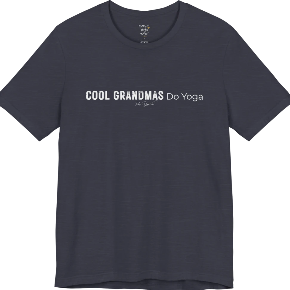 A short sleeved tee called the Grandmas T-Shirt, flat lay and a soft cotton blend shirt. Simply says, Cool Grandmas Do Yoga. Design highlights bold distressed block lettering for COOL GRANDMAS beside thin lettering for Do Yoga, with a small script signature underneath. Color is Heather Midnight Navy.
