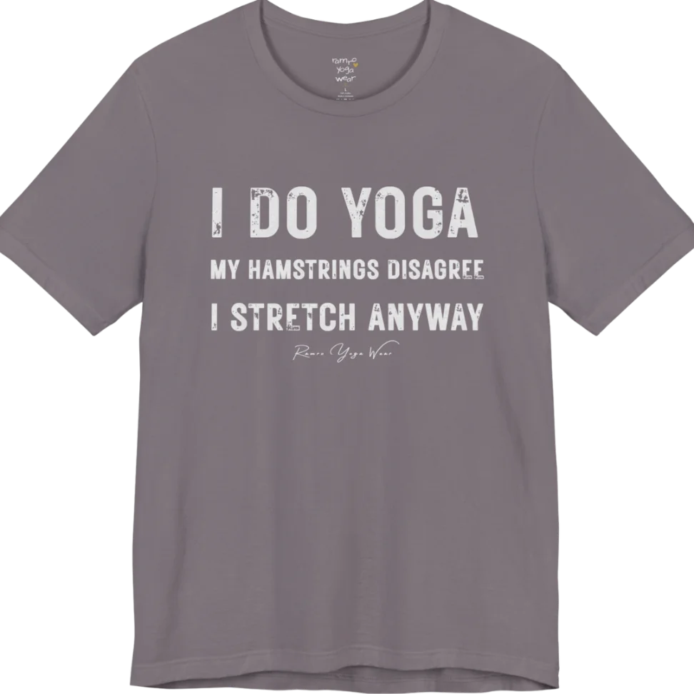 A short sleeved tee called the Hamstrings T-Shirt, flat lay and a Bella+Canvas 3001 shirt. Simply says, I Do Yoga. My Hamstrings Disagree. I Stretch Anyway. Design highlights bold distressed grunge typography in three stacked lines, with a large I Do Yoga above two smaller lines.  Most would agree with this one. Color is Storm.